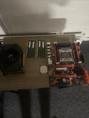 ASUS Motherboard with Black and Orange Accents + RAM & GPU